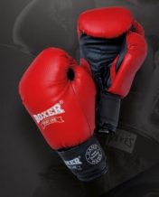 Замовити Перчатки боксерские  6-12oz (кожвинил 0,6мм, нап. -пенопоролон)